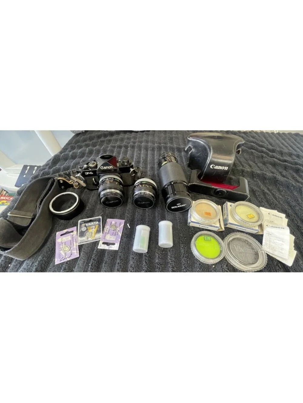 CANON F-1 FILM CAMERA WITH LENSES, CASE, FILM AND MORE *TESTED, READ DESC*